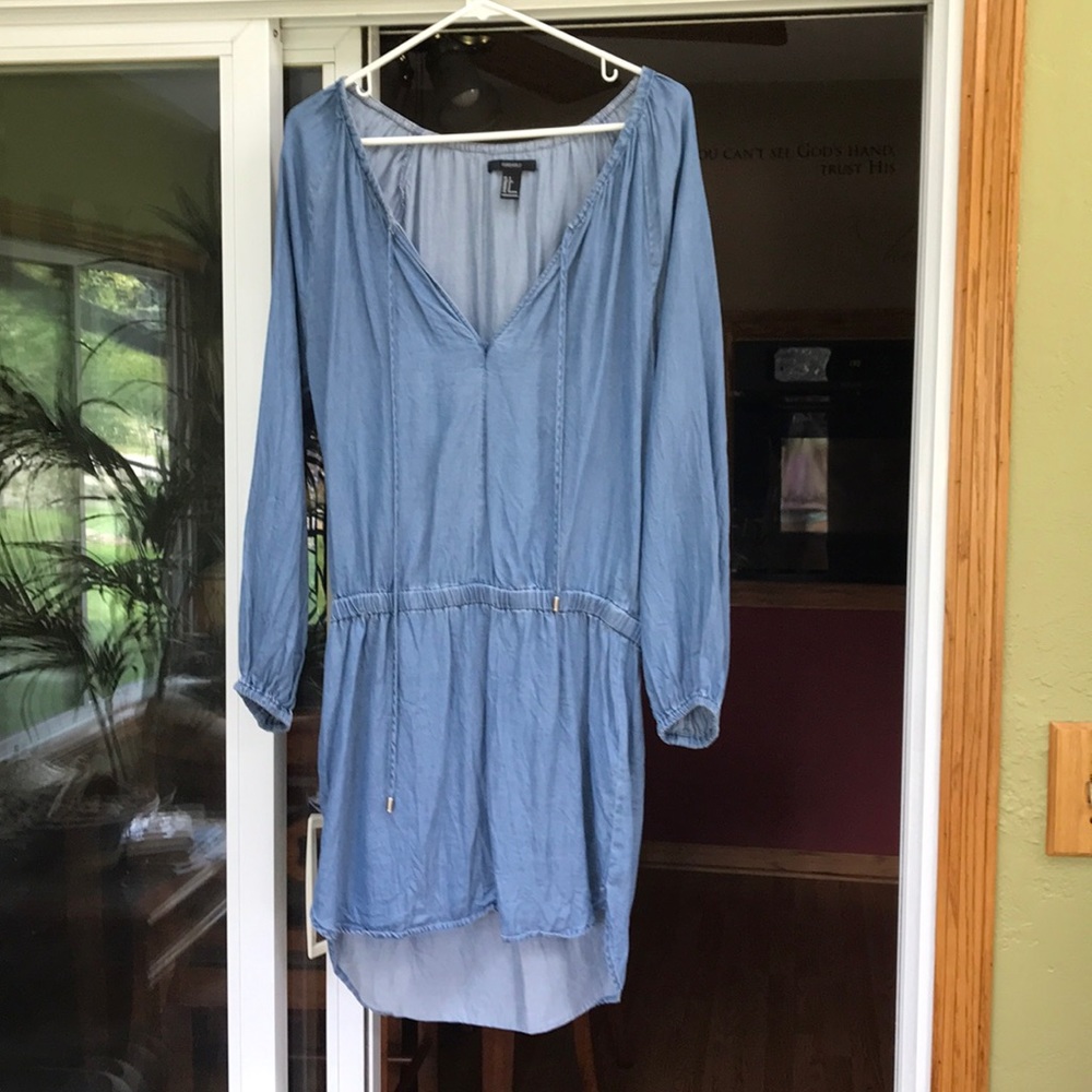A cute denim style dress that was worn once